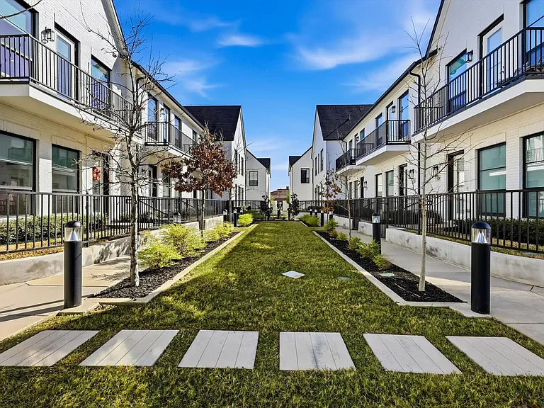 This unit faces a community greenbelt.