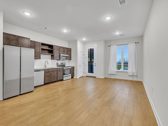 3rd image of 600 E Trinity Ln #203