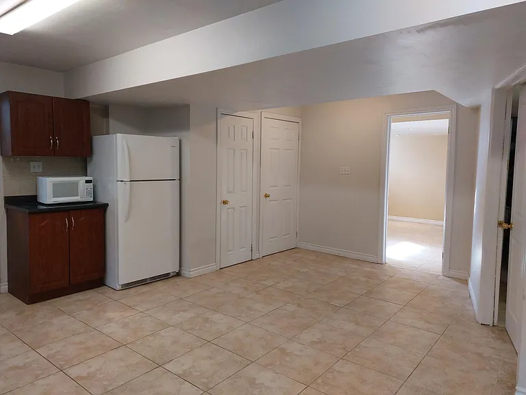 Space in the living room for dining. This is a large living room with enough space for both relaxing and dining.
