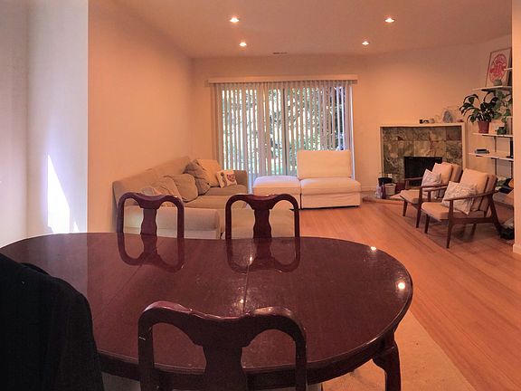 Living room + dining room (Photo from prior tenancy, shown for layout)