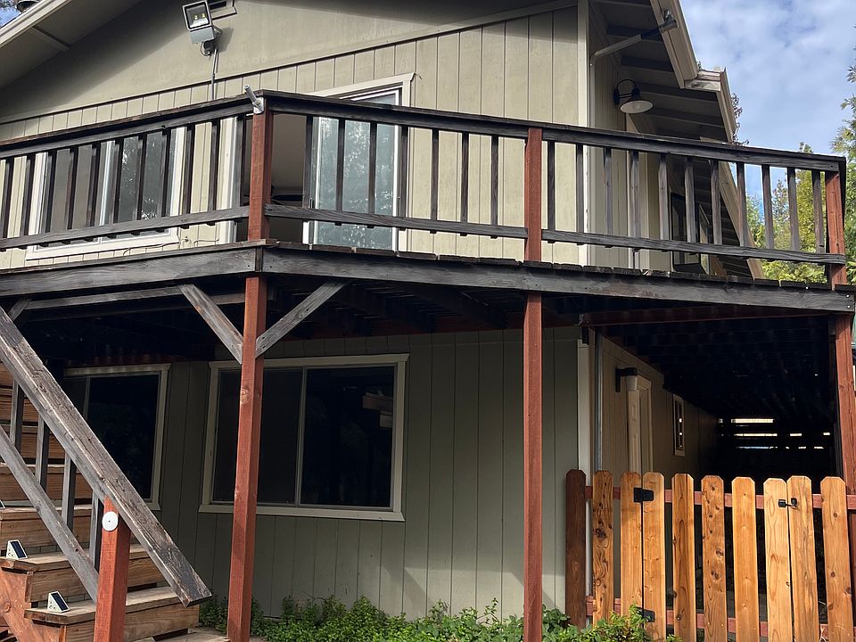 2 story home with small dog area from lower deck