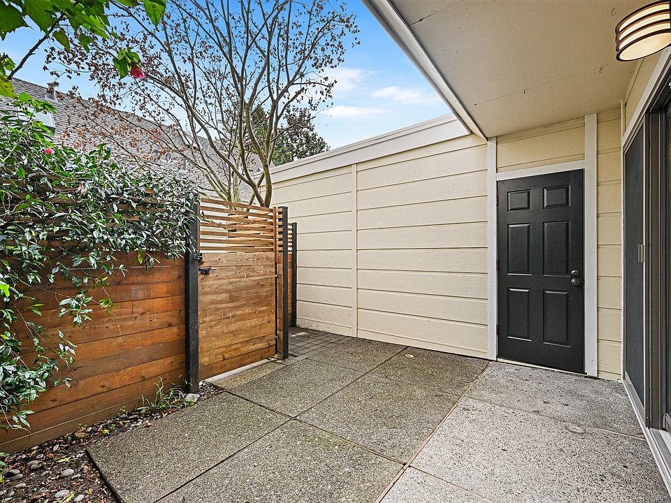 Private gated patio, door to the garage