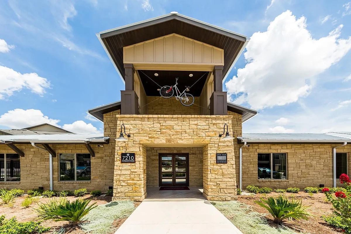 Photo 1 of 37 - Legacy Creekside Apartments - San Antonio, TX Entrance Into Leasing Office - Legacy Creekside Apartments