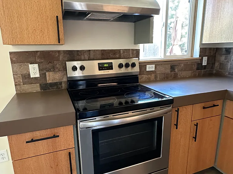 Nicer stainless vent hood.
