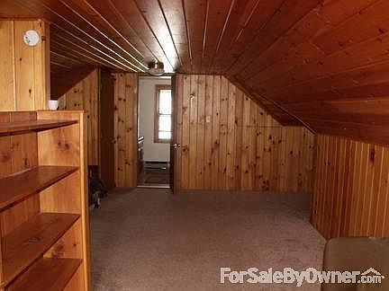 Upstairs Master Suite
						:
						Tongue & groove w/built in bookcase bathroom with shower in the upstairs