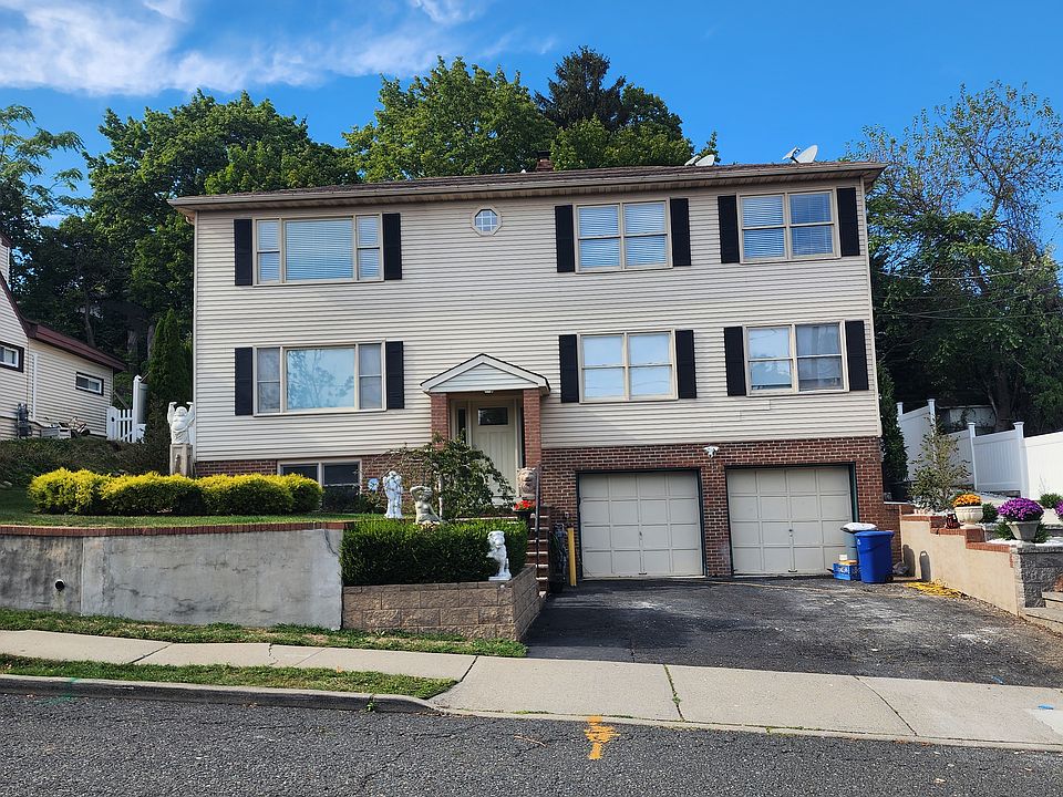 2nd Floor Unit with 1 Attached Garage with opener. 1 Car Space and Ample Street Parking