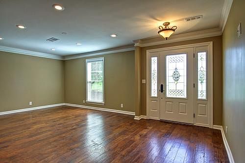 Beautiful entry doors with leaded glass.