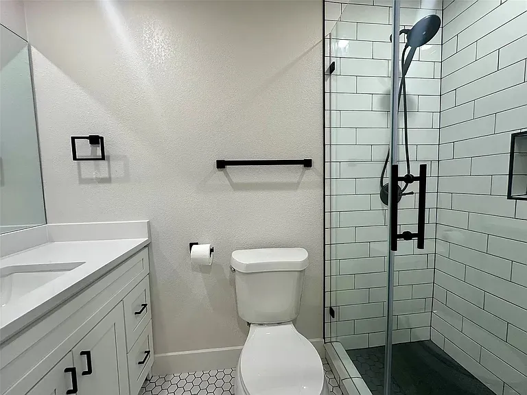 Full downstairs bathroom for private use by occupant of one of the secondary bedrooms.