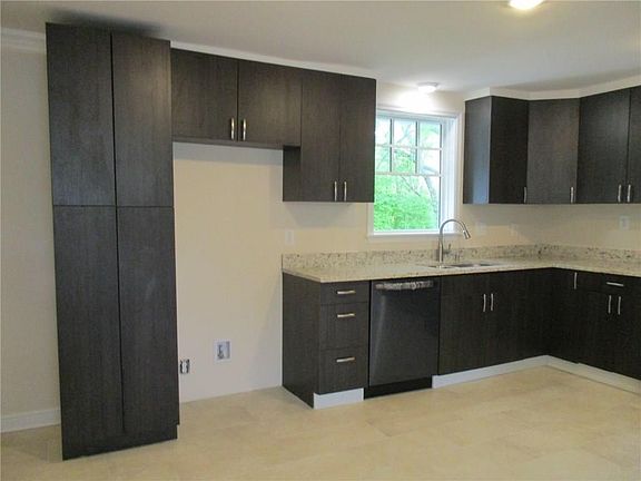 New Cabinets feature Large Floor to Ceiling Pantry