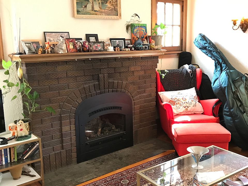 Sunny living room with gas fireplace