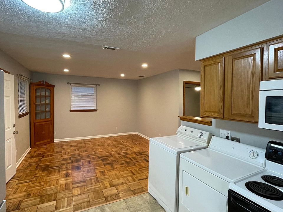 Kitchen comes with full size fridge, microwave and range as well as a full size washer and dryer.