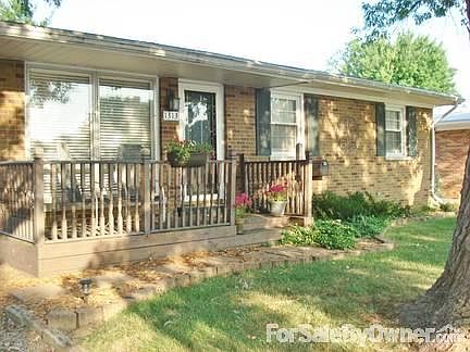 Front door and porch
						:
						House and front porch are nicely shaded and offer a great place to relax.