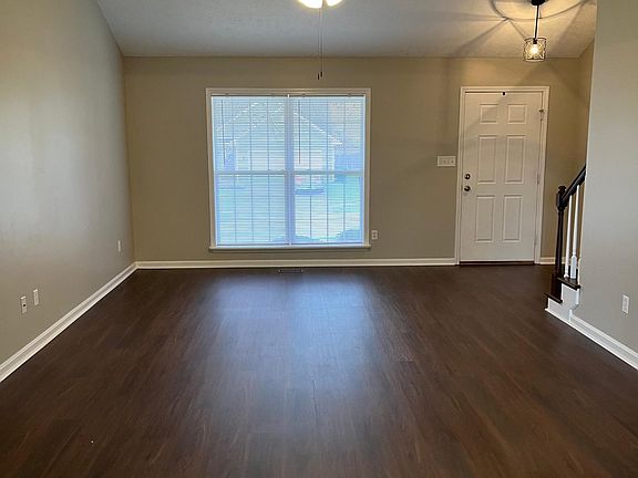 large great room with vaulted ceiling