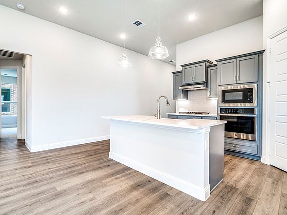 Kitchen adjacent to dining area
