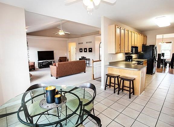 Breakfast room, breakfast bar, great room, kitchen and dining room. Kitchen features 42" cabinets & 