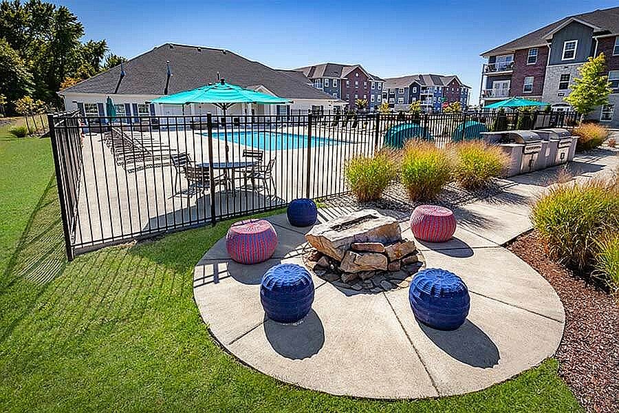 Lounge fireside, grill with friends, or take a dip_this outdoor space brings together all the best parts of a summer evening.