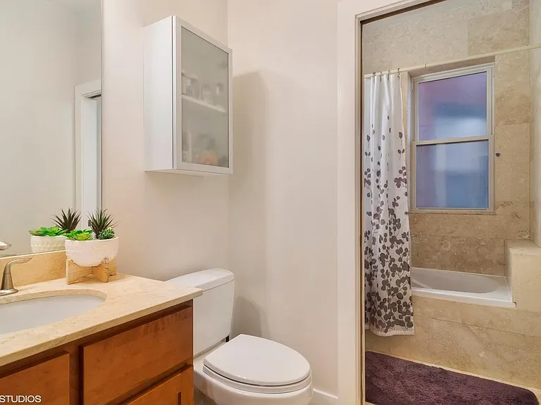 Upstairs bath - 2nd sink (not in view) is in shower room