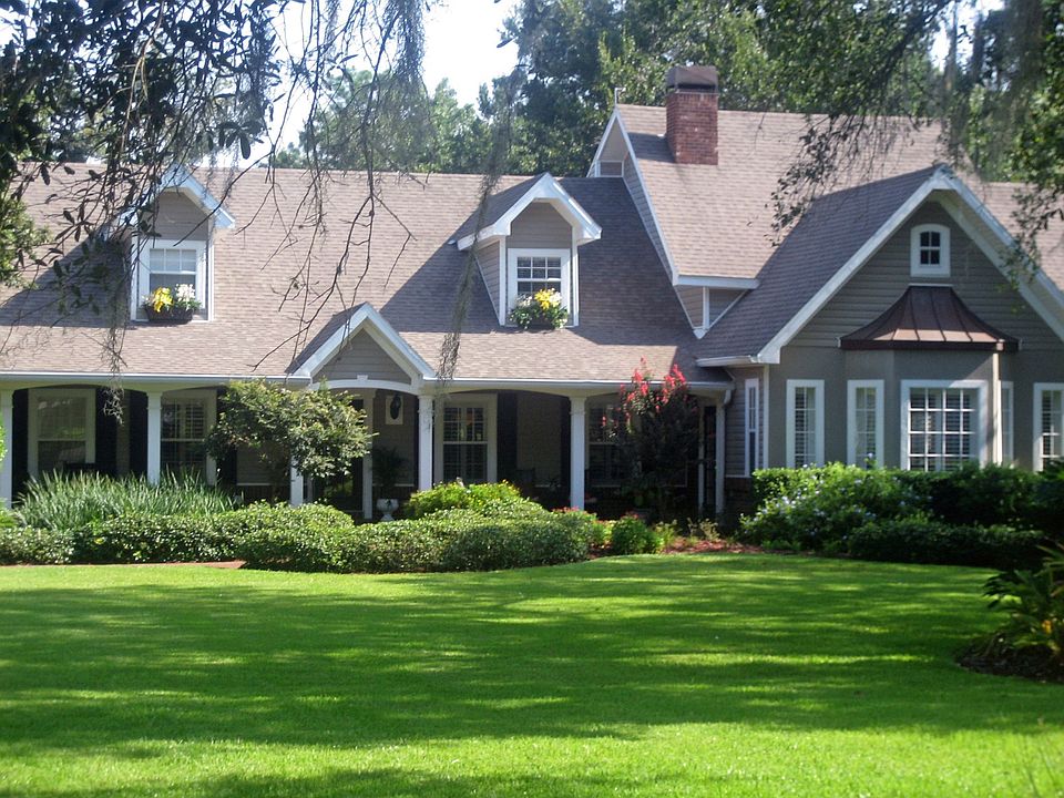 front, detached garage to left