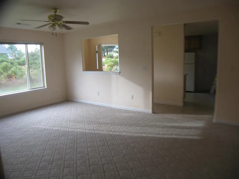 Living room looking toward kitchen