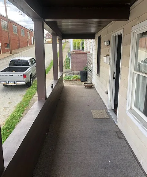 great big front porch with amazing view of the city along with street parking!