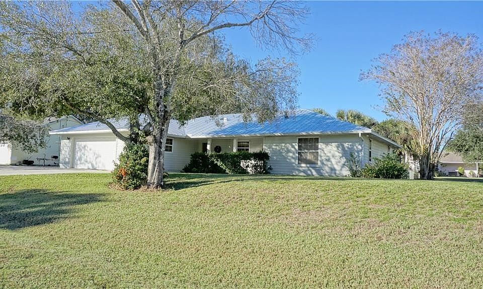 Wonderful 3 bedroom, 2 bath home with office and 2 car garage on 1/2 an acre