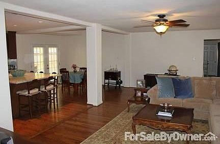 Den and Kitchen view 2 : Double door in breakfast room to the back deck.