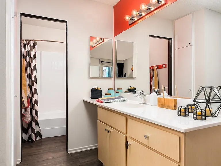 Classic Package II bath with white laminate countertop, oak cabinetry, and hard surface flooring