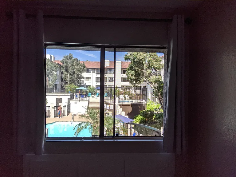 Bedroom 1 view to the pool