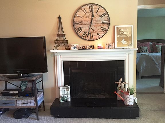 Family room with real wood-burning fireplace!