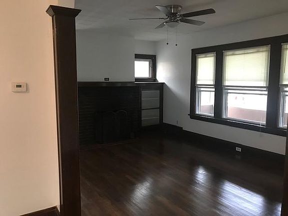 Very spacious living room! Gorgeous refinished hardwood floors throughout the entire apartment!