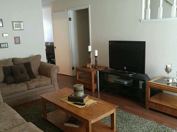 Large living room with wood floors