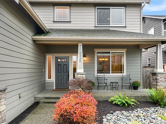 Covered front porch to greet your guests and relax in the shade.