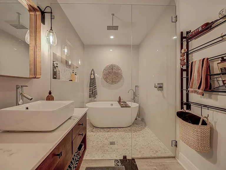Rain shower head in master bedroom.