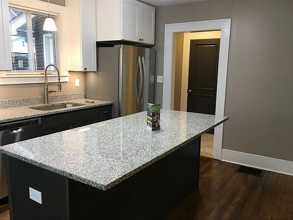 Updates kitchen with huge island