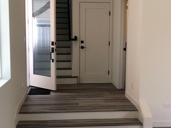 418 front door entry. Half bath on first floor along with garage entry

Yes! half bath on 1st floor 
Entry from garage recessed lighting
large windows and a slider to the yard