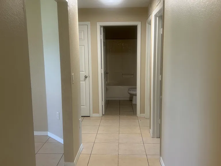 Guest bedrooms and bathroom side of home
