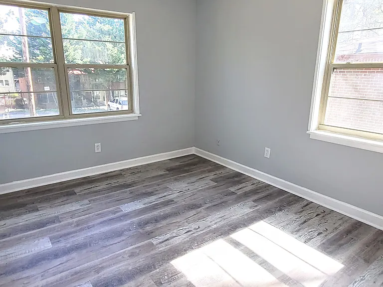 Bright, fully remodeled Bedroom #1 with abundant natural light