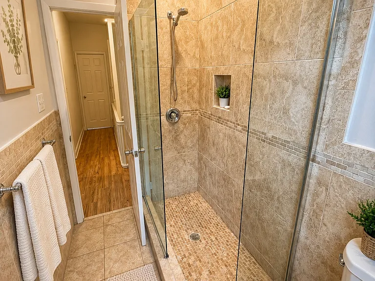 This is the hall bathroom the two upper bedrooms share; note it is located 1 floor down on the first upper level.
