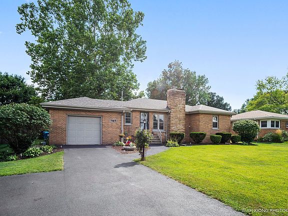 All Yellow Face Brick around entire home including Bonus Room addition. Driveway widens at the entrance to allow for 2 cars addi