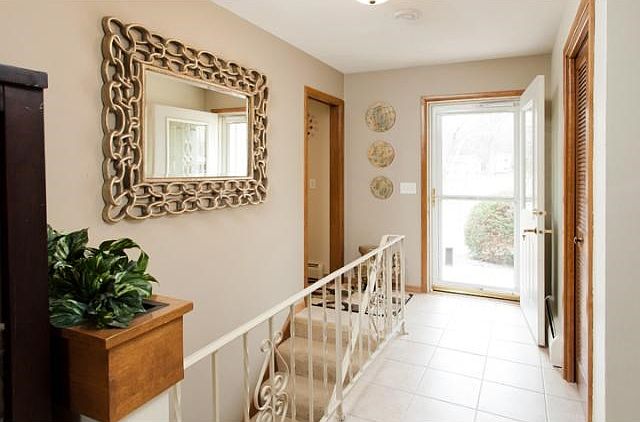 Two sided fireplace with eat-in kitchen dining space