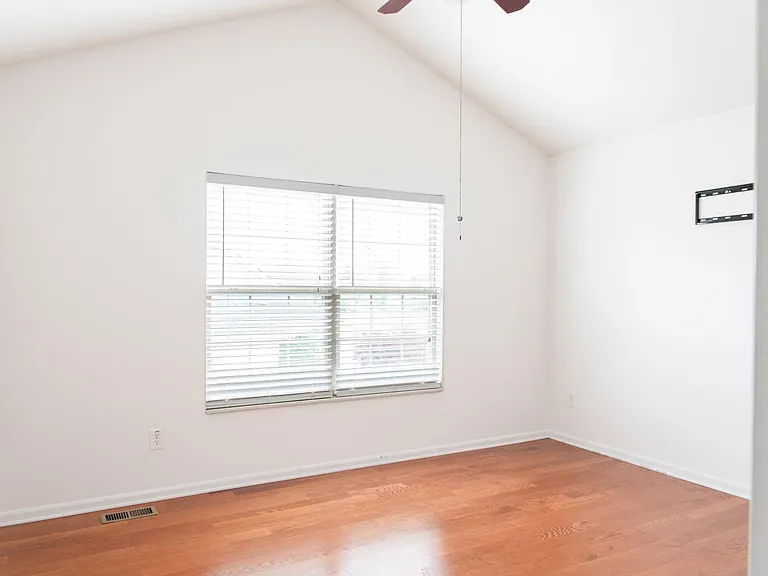 Large upstairs bedroom with vaulted ceiling