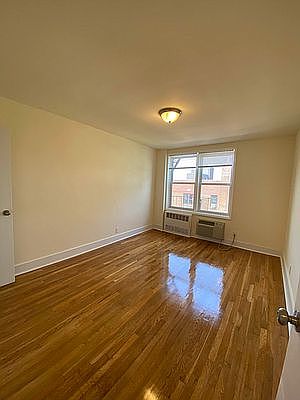 2nd image of 64-49 Wetherole St #7D
