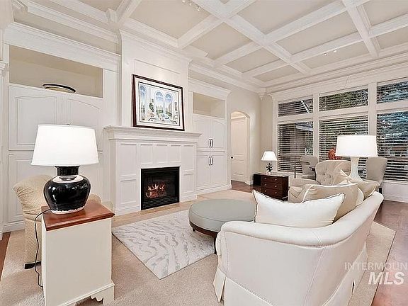 Living room with built ins and fireplace