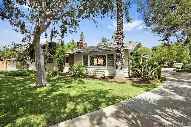 Expansive front yard and circular pass-through driveway
