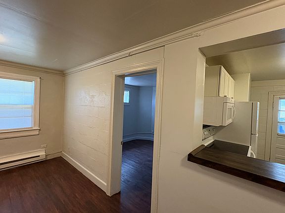 LIving room leading into bedroom