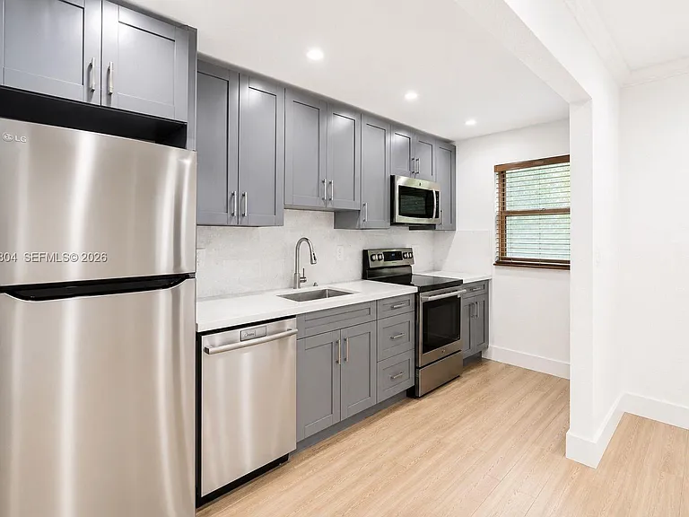 5839 SW 74th Ter #103 — Photo 2
