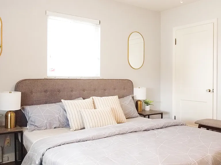 2nd Bedroom: With an Office and a Cute Window Covered by Red Awning
