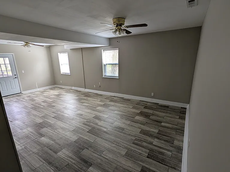 lower level ensuite 3rd bedroom or 2nd living area, exterior access via lower deck