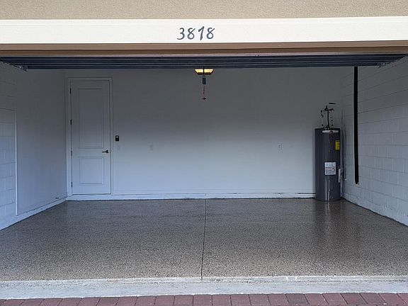 Garage with epoxy flooring.