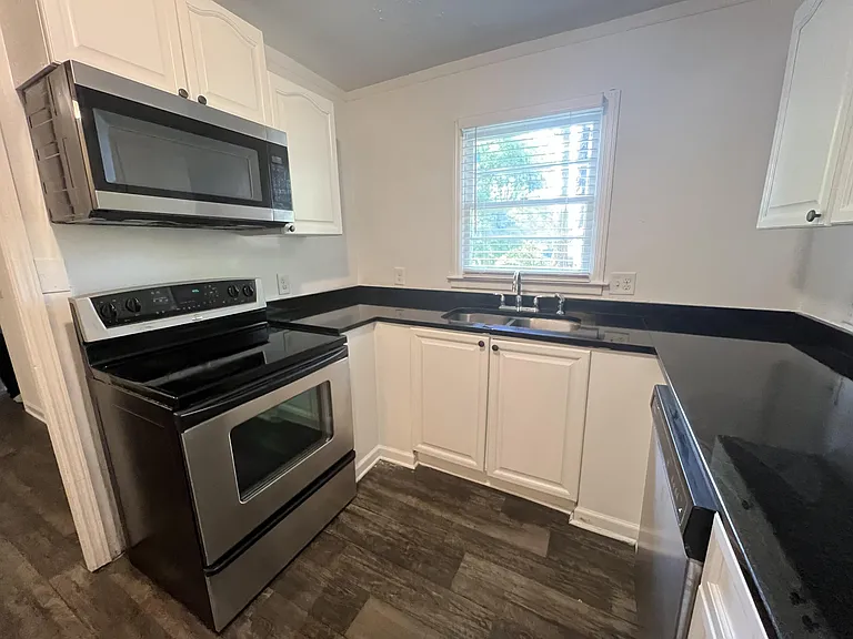 Open kitchen with large appliances